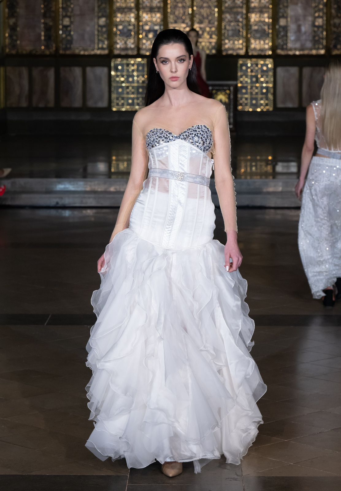 Cloud white structured corset gown with layered organza ruffles from Saanjh by Saloni London Fashion Week 2026 collection