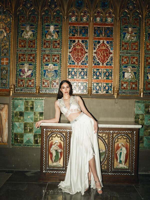 Luxury white draped bridal skirt with hand-embroidered structured blouse from Cloud Devotion collection by Saanjh by Saloni, London Fashion Week